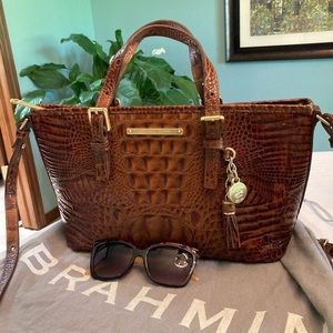 Brahmin Asher tote/shoulder bag. Sunglasses help show the size of this bag.